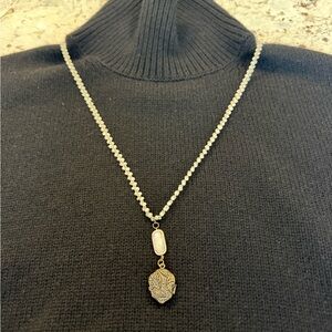 Elegant double braided 2mm white pearl necklace, charm engraved “love hurts”.